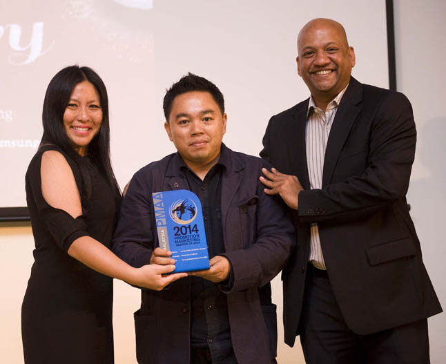L to R Magdalene Lee Director of PR and Eric Cruz Executive Creative Director recieving the award for Samsung Wind Chimes in a Bakery at PMAA Dragons of Asia 2014.jpg