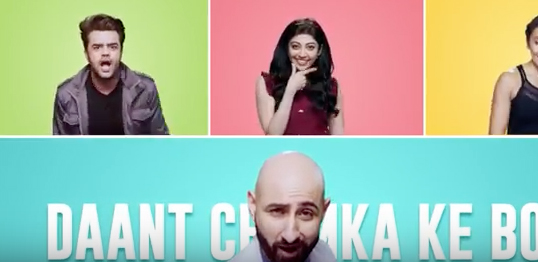 Brush Them Well says the singing dentist in a campaign from FoxyMoron for New Colgate Total in India