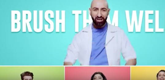 Brush Them Well says the singing dentist in a campaign from FoxyMoron for New Colgate Total in India