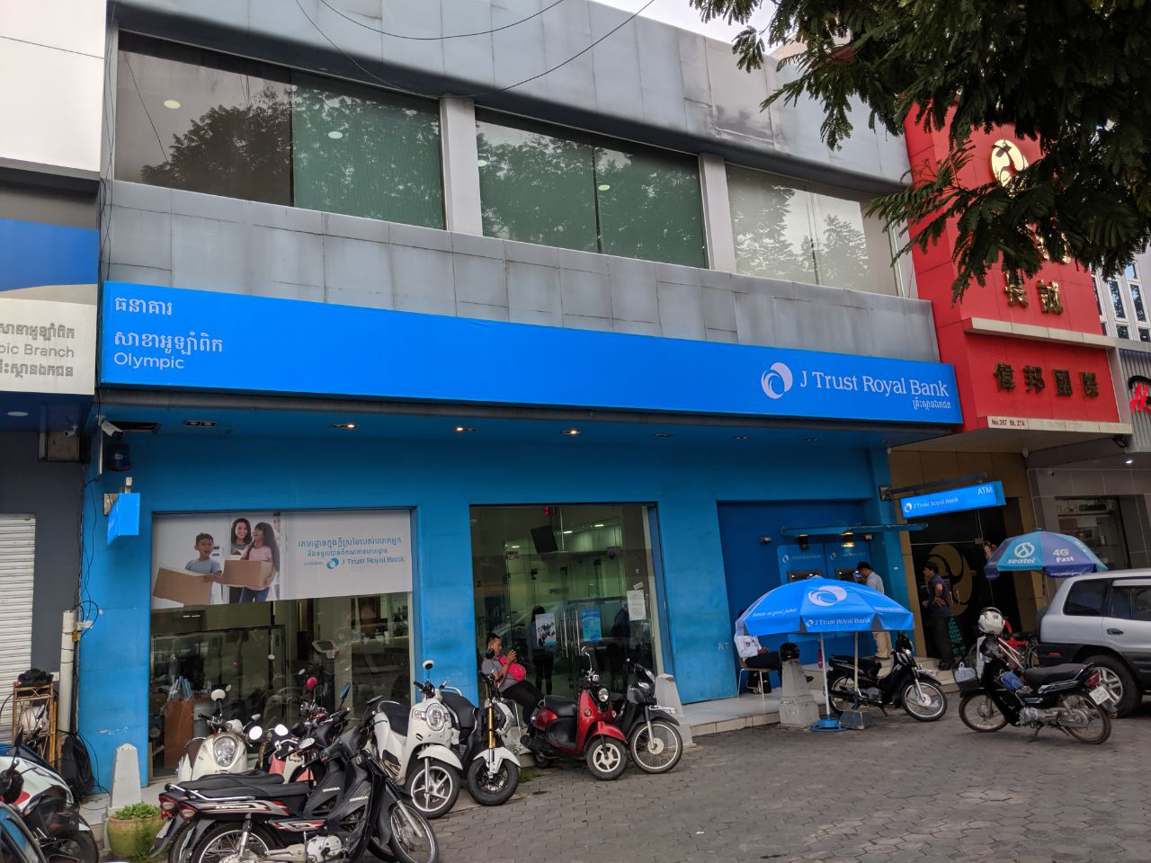 Comzone Cambodia performs mission possible for J Trust Royal Bank re-branding exercise