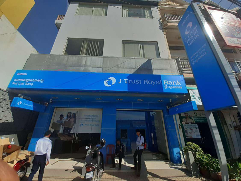 Comzone Cambodia performs mission possible for J Trust Royal Bank re-branding exercise