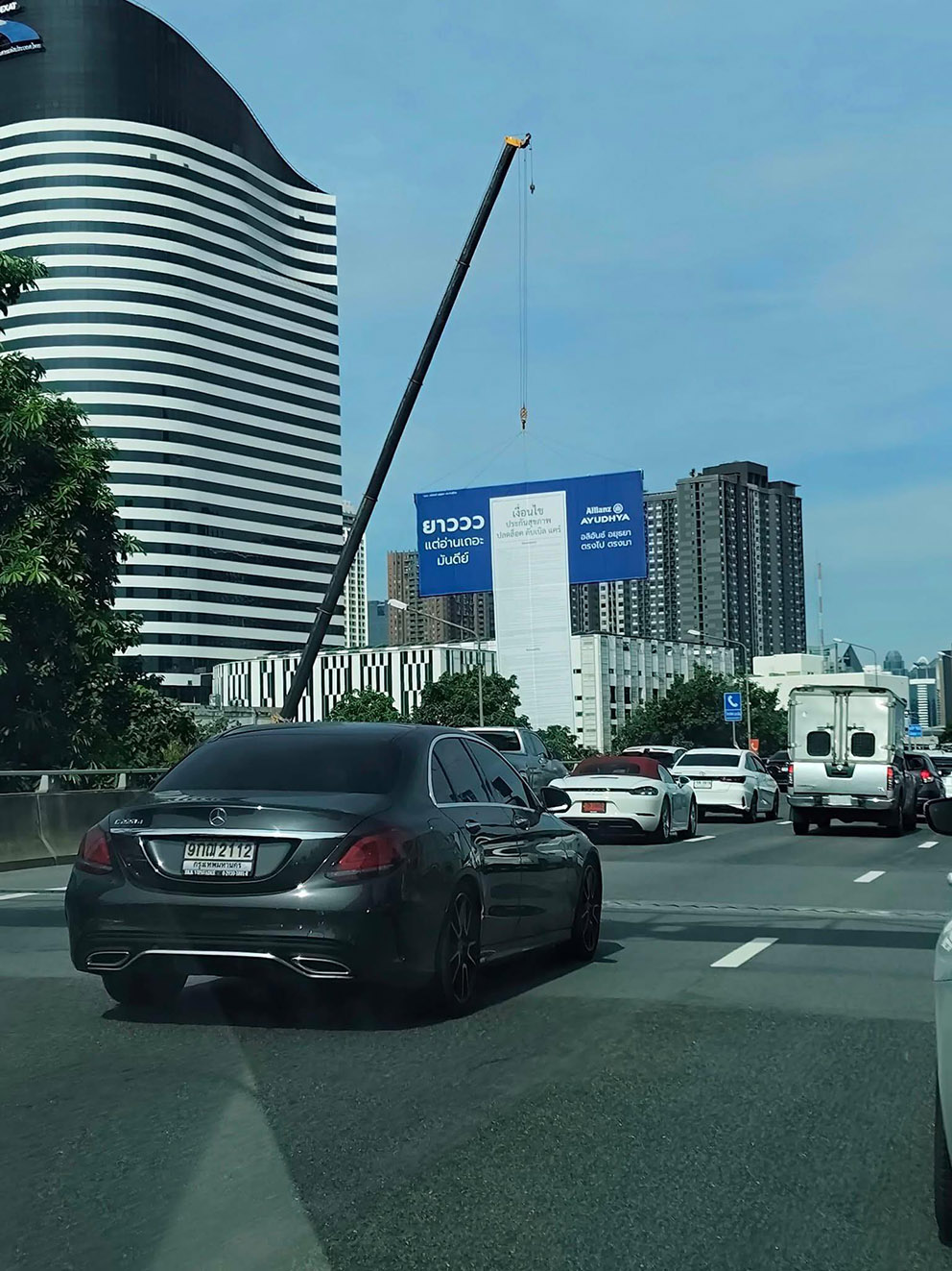 CHOOJAI & FRIENDS and Allianz Ayudhya turn fine print into a 25-meter billboard