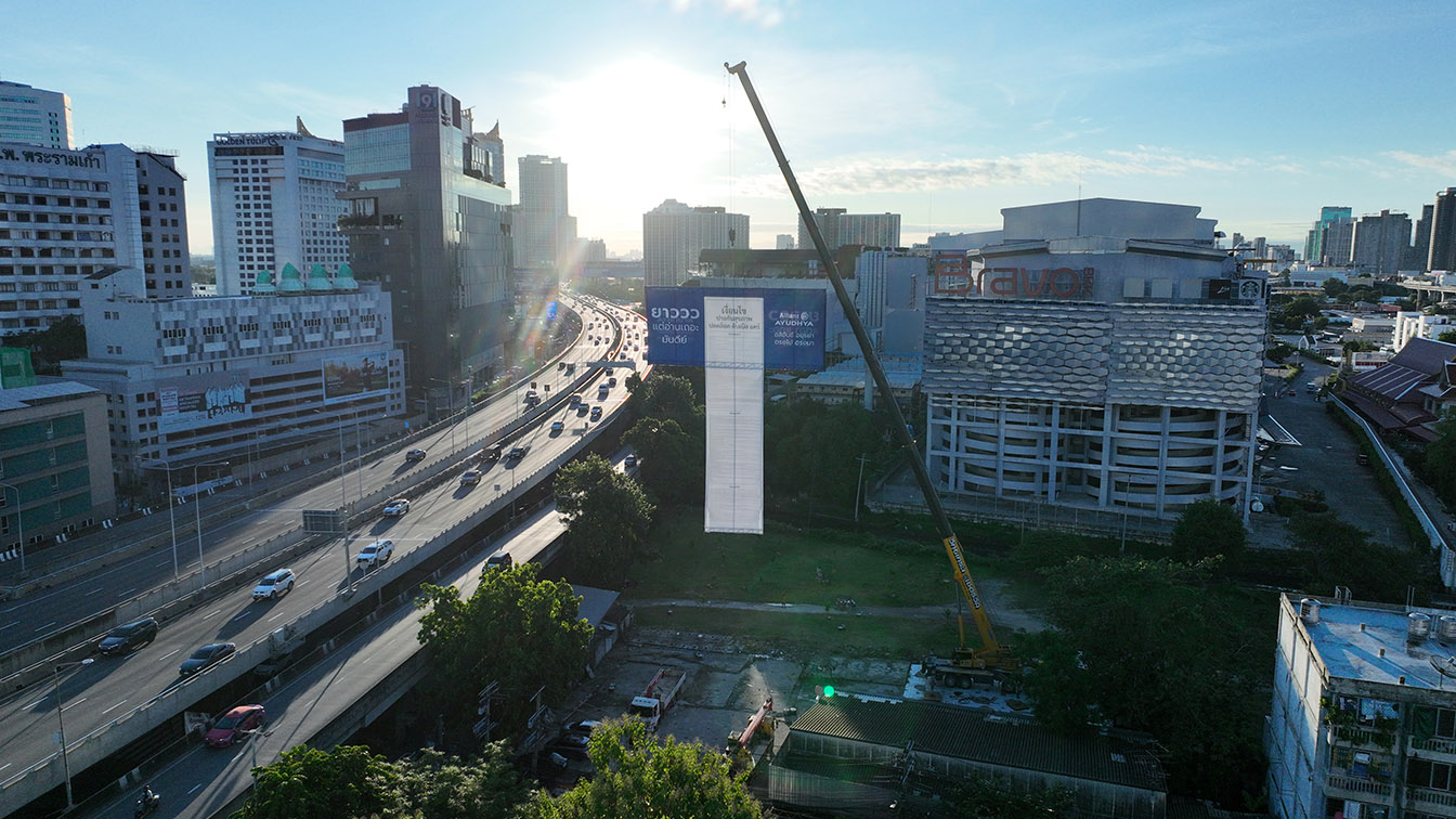 CHOOJAI & FRIENDS and Allianz Ayudhya turn fine print into a 25-meter billboard